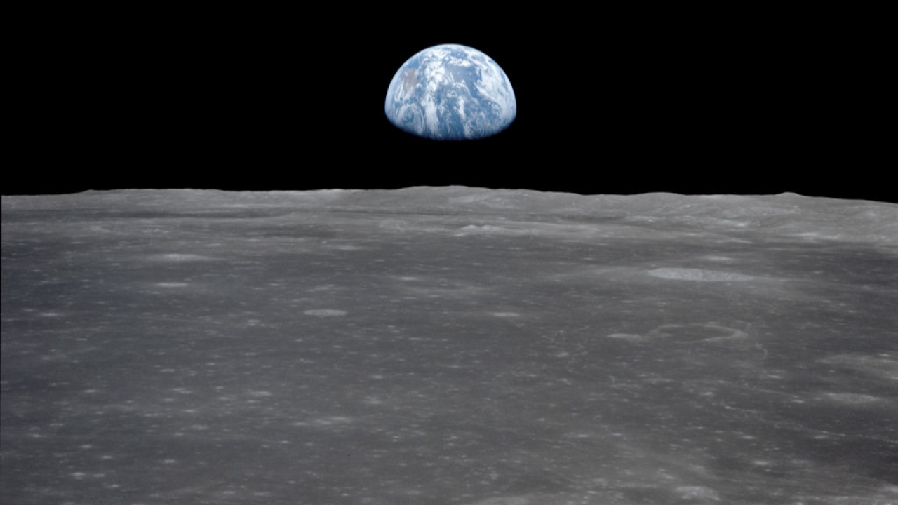 A solar wind-derived water reservoir on the Moon hosted by impact